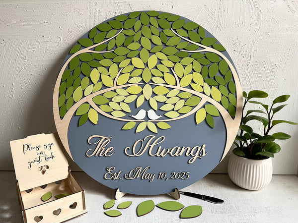 magnetic guest book set with green leaves and grey background personalized with last name and wedding date