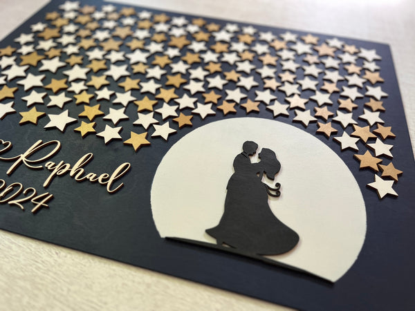 detail of moonlight dance wedding guest book alternative with stars and moon