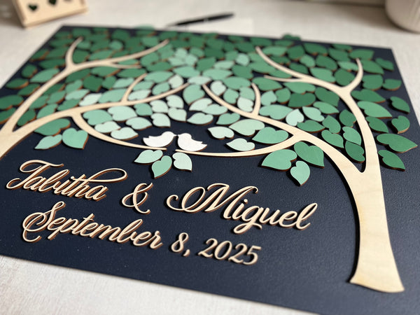 detail of Personalized wedding guest book alternative in 3D with two trees in fading green ombre effect

