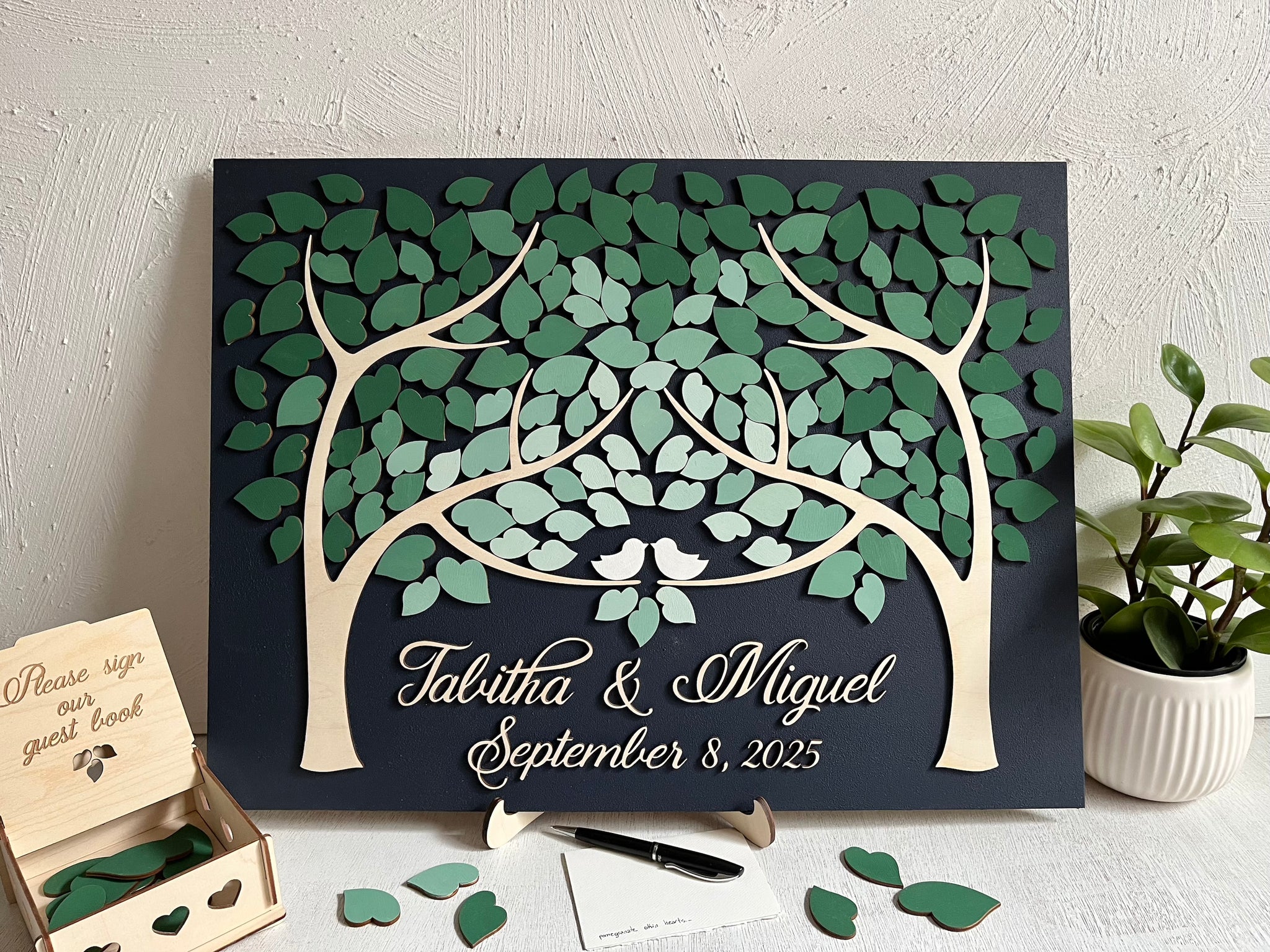 magnetic guest book alternative for wedding with personalized names and box to hold the leaves
