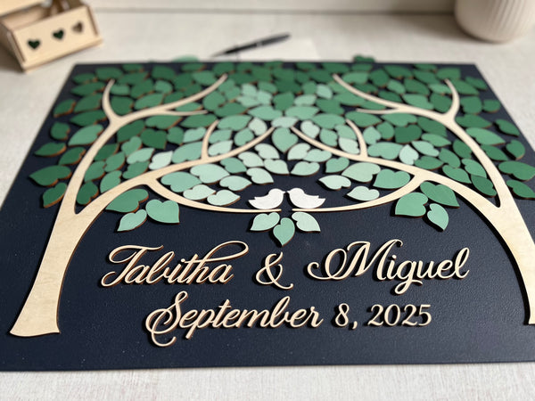 close up view of Personalized wedding guest book alternative in 3D with two trees in fading green ombre effect