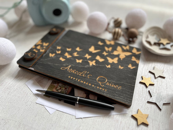 Quince guest book personalized with name and date and butterflies detail