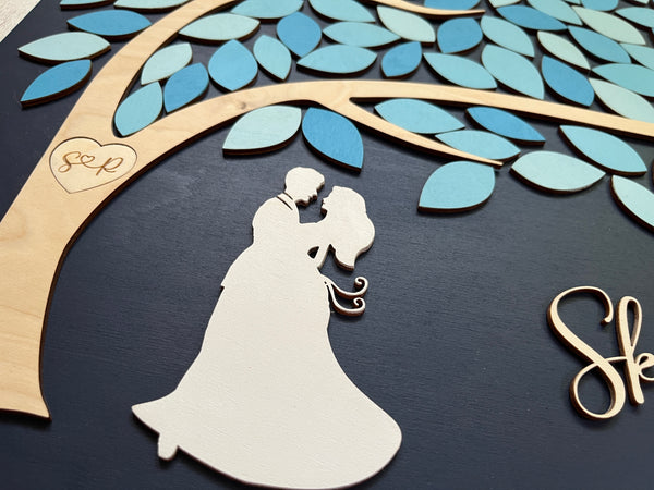 customizable silhouette for the guest book with initials in tree for the couple
