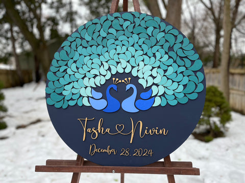 Teal ombre wedding guest book alternative with peacock, feathers for guests to sign and personalized names and wedding date
