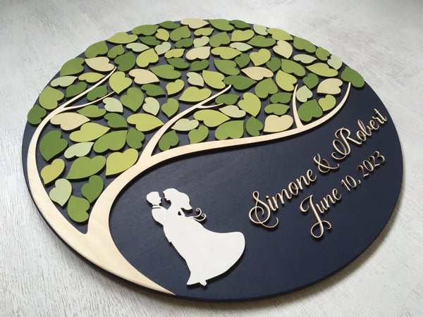 wedding guest book with one tree in a round shaped sign
