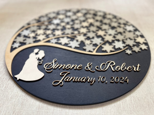 personalized winter wonderland guest book with cutout names and couple