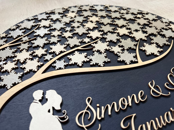 detail of snowflake guest book alternative for winter wedding