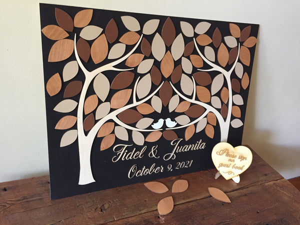 A custom guest book alternative is a way to add personalized details to your wedding, while also preserving a memory on a board that can decorate your home after the wedding