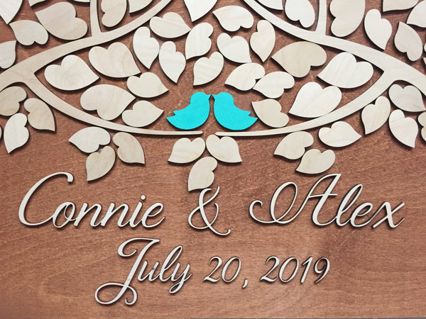 turquoise love birds in tree, rustic stain wood guest book
