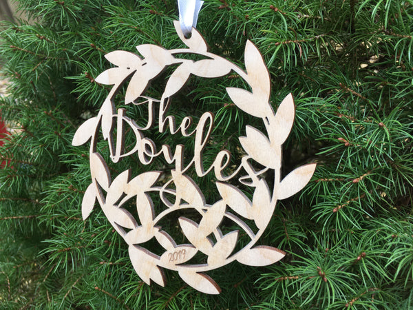 Personalized Christmas ornament with family name and engraved established year