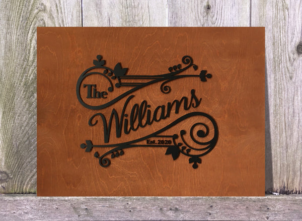 Personalized last name sign made of stained brown wood with black text for wedding guest book alternative or engagement, newlyweds gift