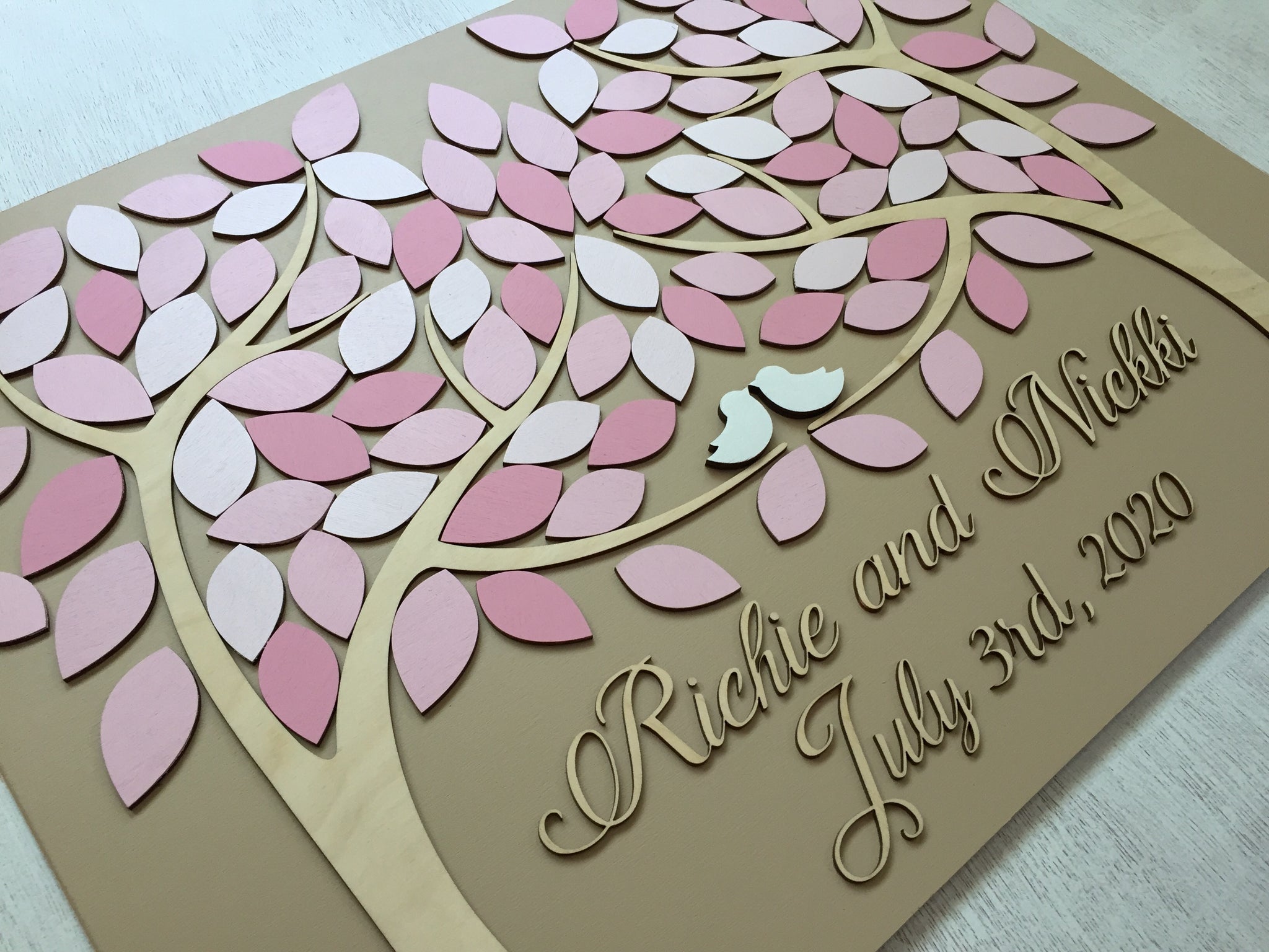 Personalized tree of life guest book alternative for wedding, virtual wedding or anniversary on pink color scheme. The leaves can be sent unattached for virtual wedding attendees