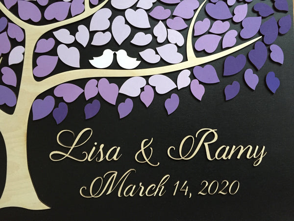 detail of purple wedding guest book