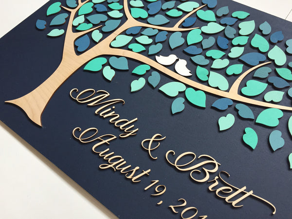 detail of wedding guest sign in with 3 d tree and leaves hearts by SignYouStyle