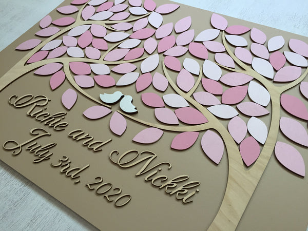 The picture shows a detail taken from a side to highlight the white love birds and the leaves in shades of pink