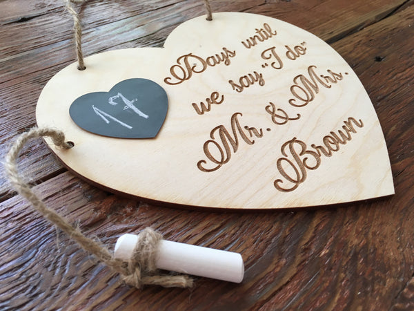 made on wood and engraved with personalized text to include your last name
