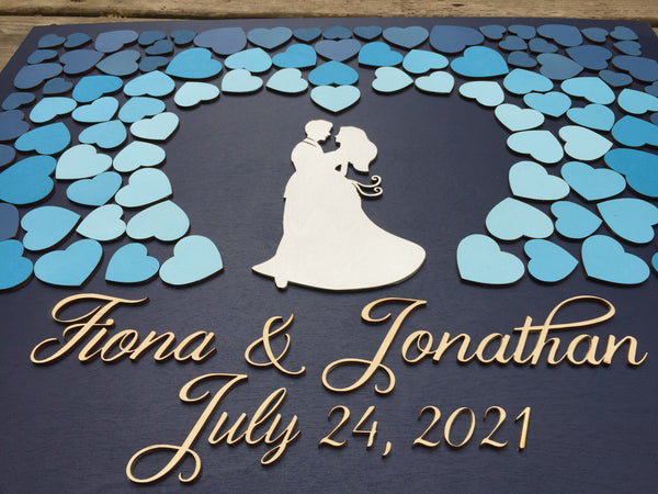 detail to show the persoanlized names and wedding date in 3D wood calligraphic lettering