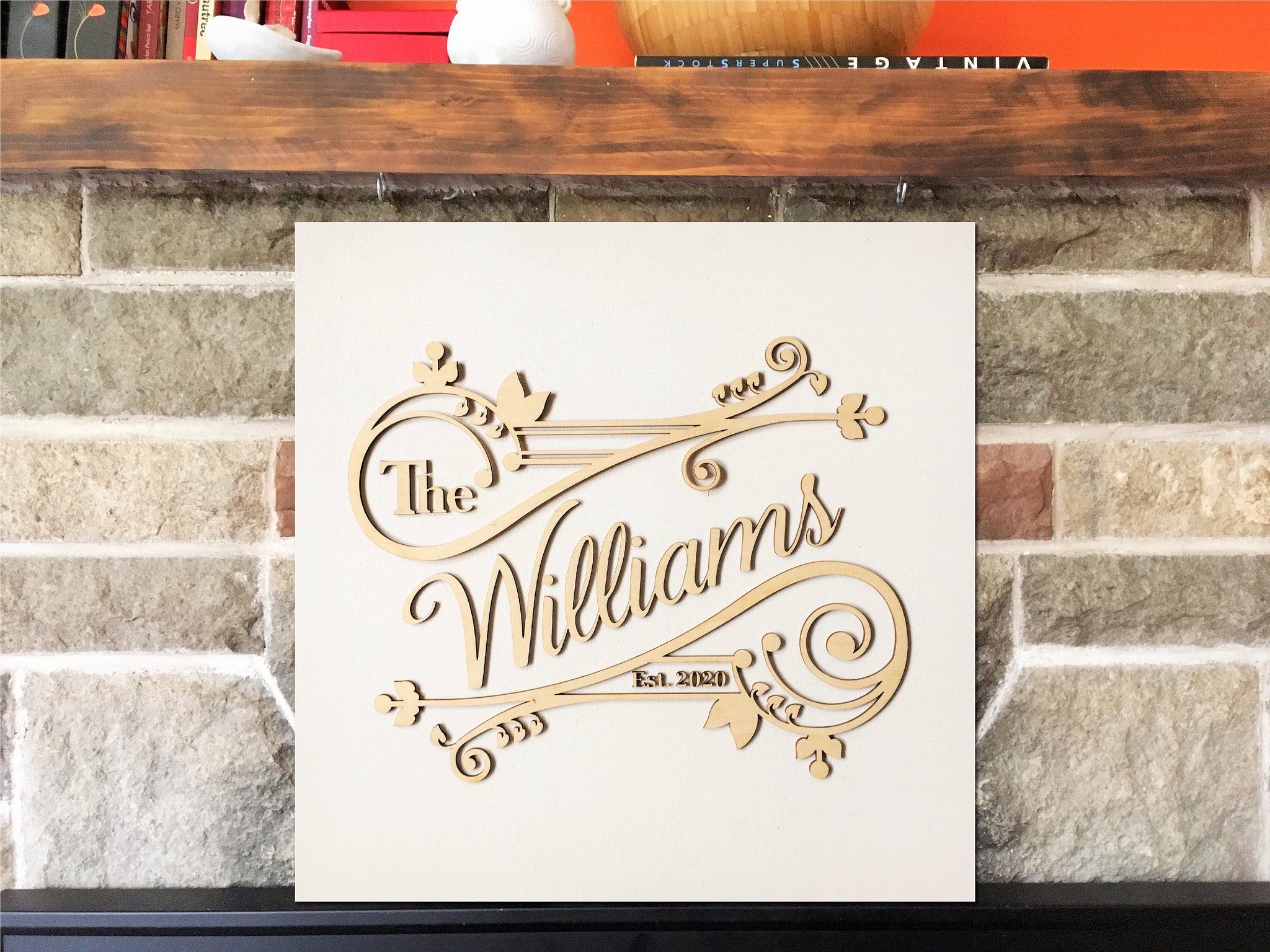family name sign made of wood with custom details and vintage style design, you choose the colors
