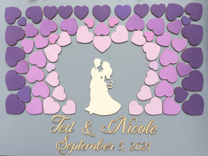 guest book alternative made of wood with purple hearts fading effect and an embracing couple with custom lettering details and fully customizable colors