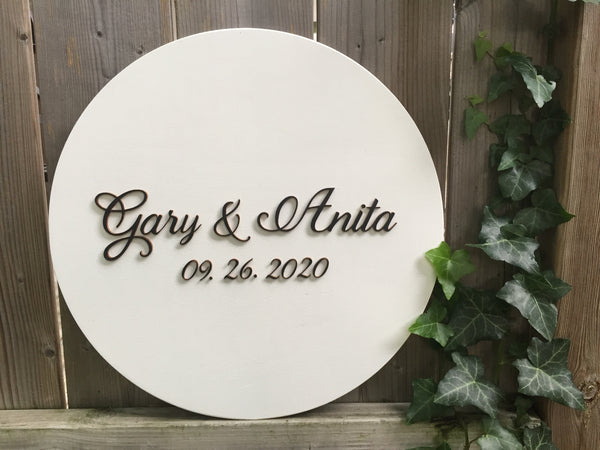 the 3D sign is customized with the first names of the bride and groom as well as the wedding date signyoustyle.com