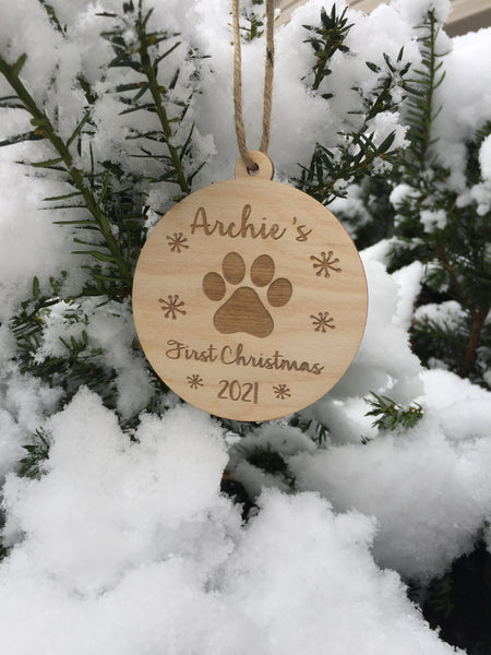 the personalized ornament comes with the name of your pet a paw print and the year your pet joined your family