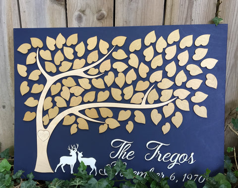 wedding anniversary guest book alternative with deer and gold leaves to sign 
