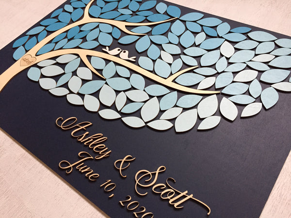 wedding sign in tree with blue ombre leaves by Sign You Style