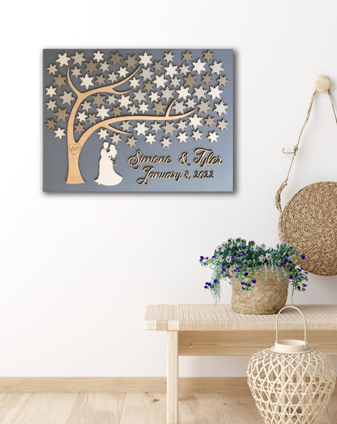 winter wedding guest book shown dispalyed in a home as wall art